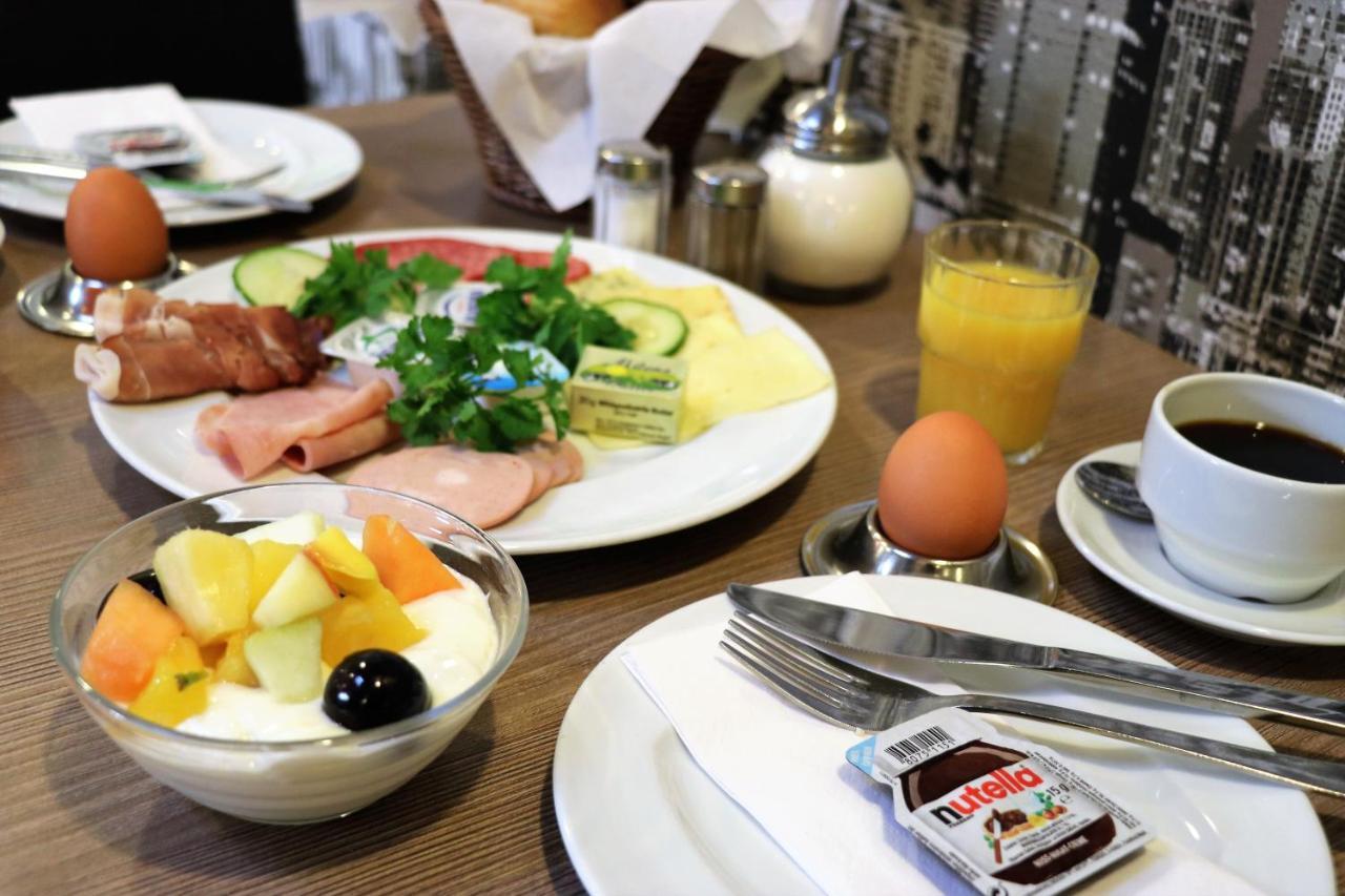 Scope Hotel Greif คาร์ลสรูเฮอ ภายนอก รูปภาพ